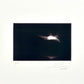 Jose Penm Abstract Photoraphy Dark rectangular frame with a light source inside on a white background