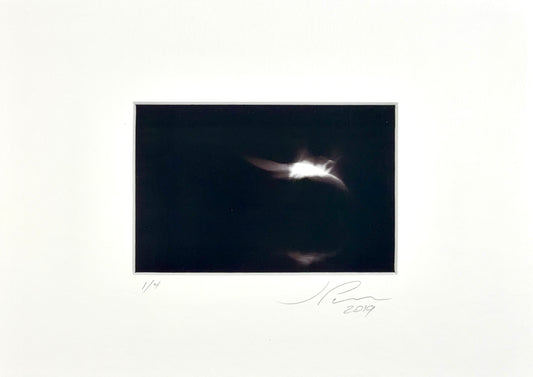 Jose Penm Abstract Photoraphy Dark rectangular frame with a light source inside on a white background